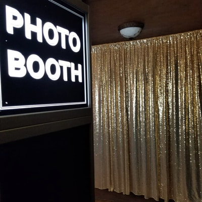 This is a common photo booth. It is vintage and also is open air.
